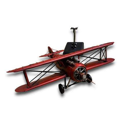 Avión en hojalata decorativo